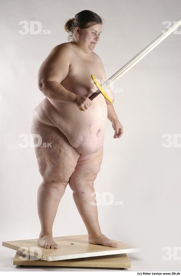 Whole Body Woman Pose with sword Nude Overweight Studio photo references