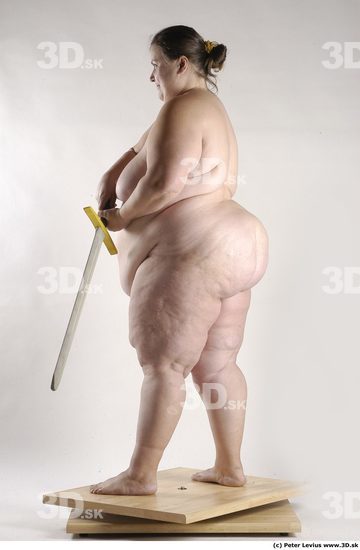 Whole Body Woman Pose with sword Nude Overweight Studio photo references