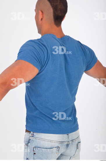 Upper body blue tshirt photo reference of Regelio