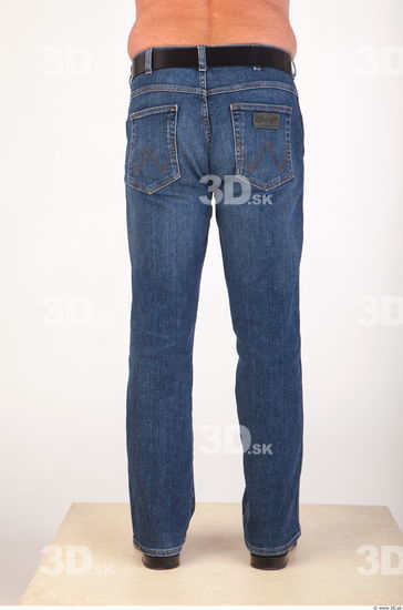 Leg deep blue jeans of Ed