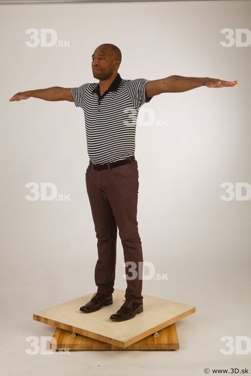 Whole body black white striped shirt brown jeans brown shoes modeling t pose of Arturo
