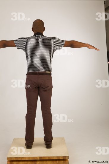 Whole body black white striped shirt brown jeans brown shoes modeling t pose of Arturo