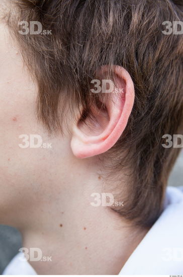 Young man teenager ear reference