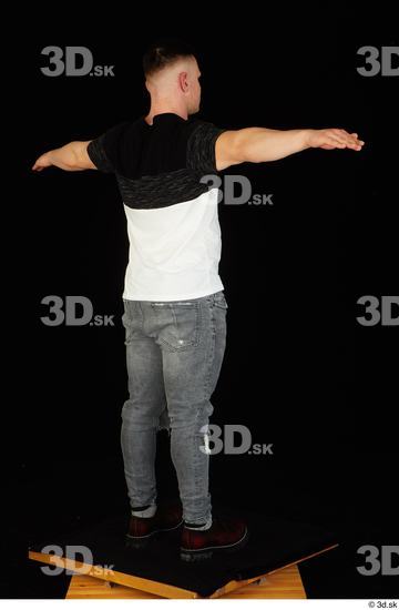 Whole Body Man T poses White Shoes Shirt T shirt Jeans Average Standing Studio photo references