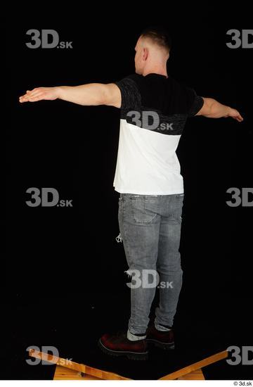 Whole Body Man T poses White Shoes Shirt T shirt Jeans Average Standing Studio photo references