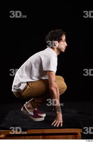 Whole Body Man White Shirt Trousers Slim Kneeling Studio photo references