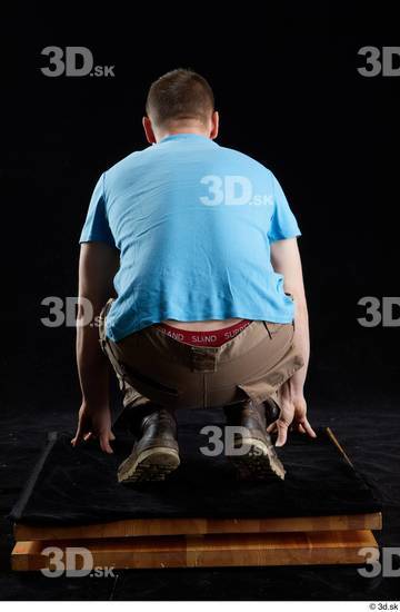 Whole Body Man White Shoes Shirt Trousers Average Kneeling Studio photo references