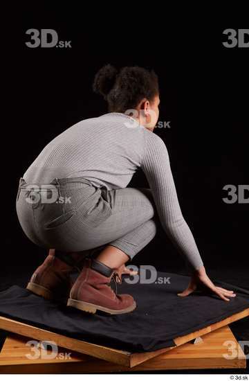 Whole Body Woman Black Sweatshirt Trousers Average Kneeling Studio photo references