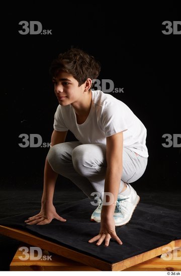 Whole Body Man White Sports Shirt T shirt Sweatsuit Kneeling Studio photo references