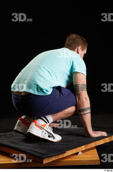 Whole Body Man White Sports Shoes Shirt T shirt Shorts Average Kneeling Studio photo references