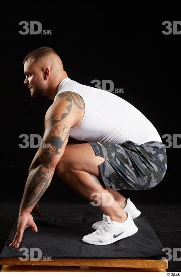 Whole Body Man White Sports Shorts Muscular Kneeling Top Studio photo references