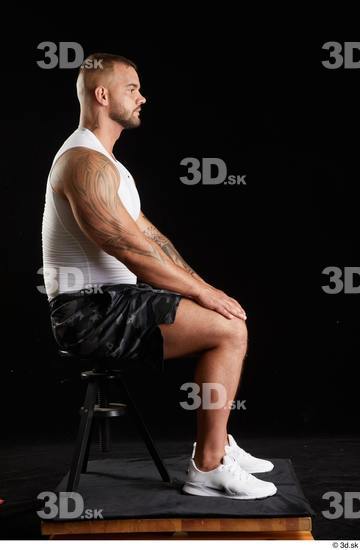 Whole Body Man White Sports Shorts Muscular Sitting Top Studio photo references