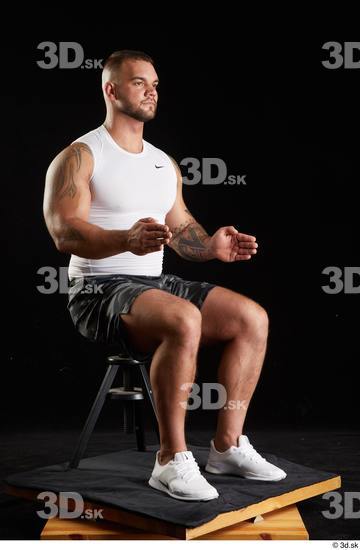 Whole Body Man White Sports Shorts Muscular Sitting Top Studio photo references