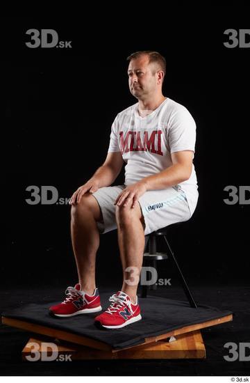 Whole Body Man White Sports Shirt Shorts Chubby Sitting Studio photo references