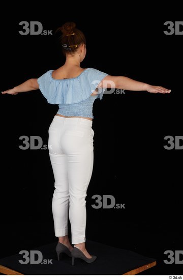 Serina Gomez blue carmen shirt casual grey high heels standing t poses white trousers whole body  jpg