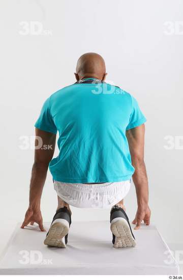 Whole Body Man Black Sports Shirt Shorts Slim Kneeling Studio photo references