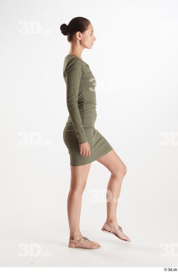 Vanessa Angel  casual dressed green long sleeve dress side view whole body  jpg