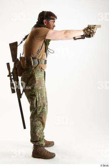 Weapons-Pistol Man Pose with pistol White Uniform Athletic Studio photo references