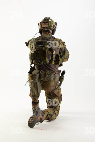 Weapons-Rifle Man Pose with machine rifle White Uniform Athletic Studio photo references