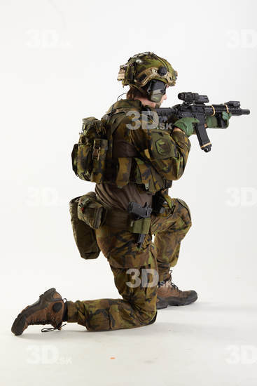 Weapons-Rifle Man Pose with machine rifle White Uniform Athletic Studio photo references