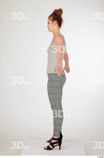 Olivia Sparkle a poses black high heels sandals casual dressed grey checkered trousers grey tank top standing whole body  jpg