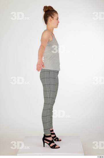 Olivia Sparkle a poses black high heels sandals casual dressed grey checkered trousers grey tank top standing whole body  jpg