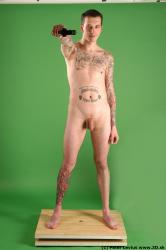 Whole Body Man Pose with pistol White Tattoo Nude Underweight Male Studio Poses