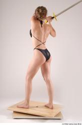 Whole Body Woman Pose with sword Underwear Muscular Studio photo references