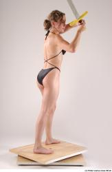 Whole Body Woman Pose with sword Underwear Muscular Studio photo references