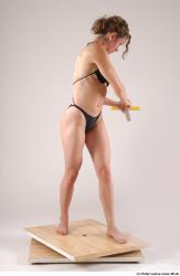 Whole Body Woman Pose with sword Underwear Muscular Studio photo references